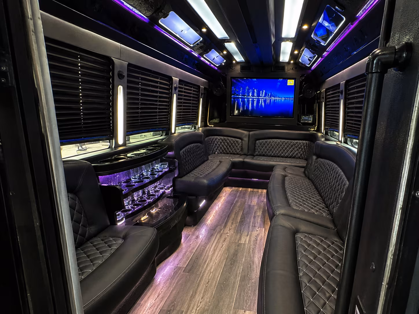 Passenger seating aboard a party bus rental serving Newark